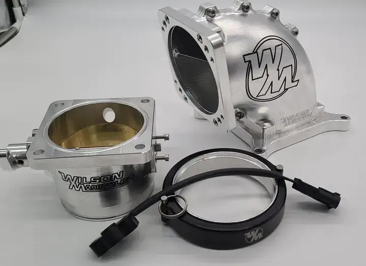Wilson Manifolds 105MM Throttle Body + 4150 Side/Side Billet Elbow Combo D-Band - Silver Machined Finish